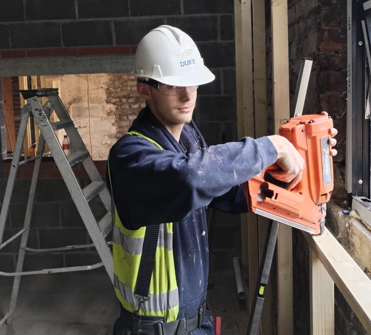 Niall Holmes working as a a joinery/carpentry apprentice 