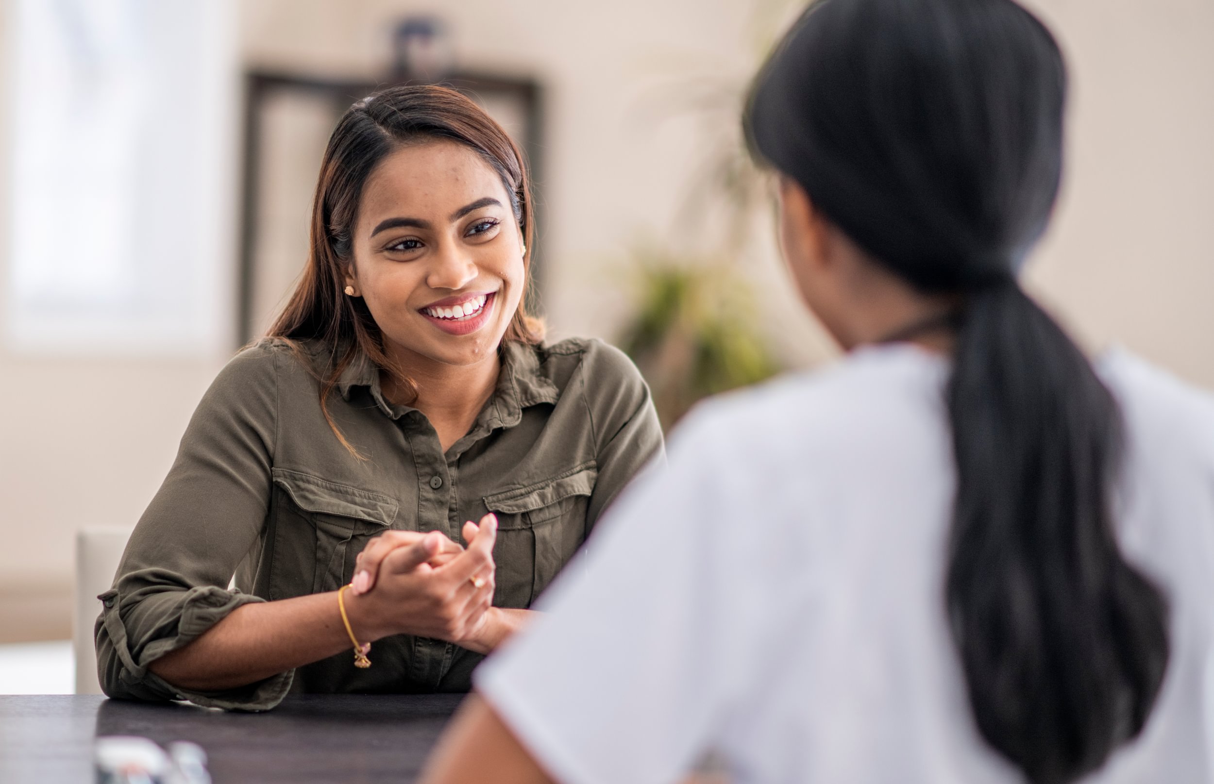 2 women having a conversation