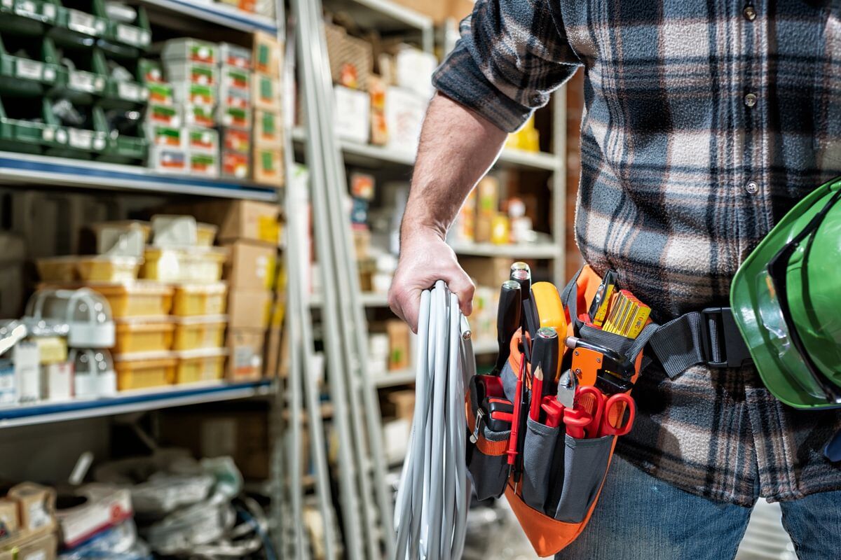 Guy carrying building materials 